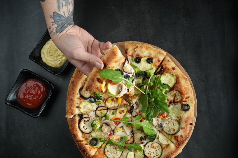 Veggie supreme via 313 pizza loaded with fresh vegetables