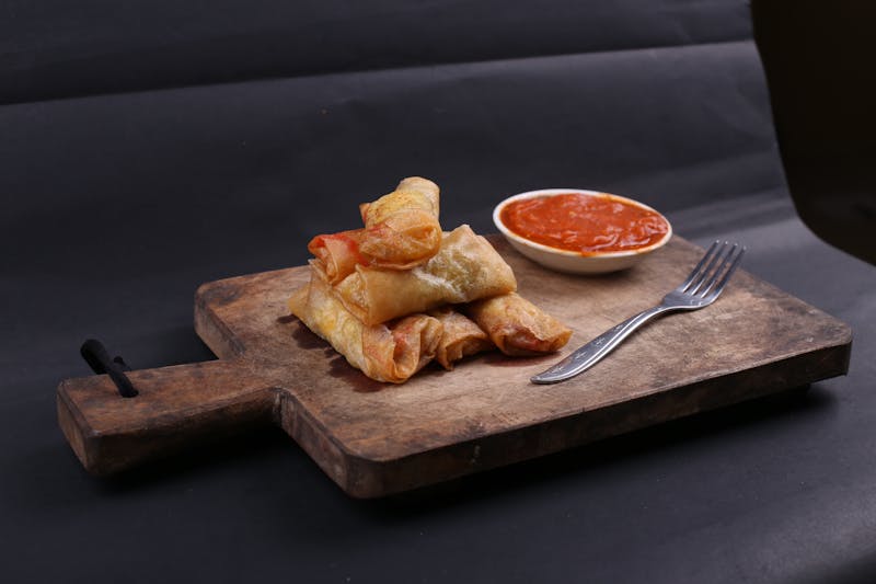 Crispy garlic bread sticks with marinara dipping sauce