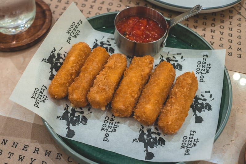Mozzarella sticks with warm marinara dipping sauce