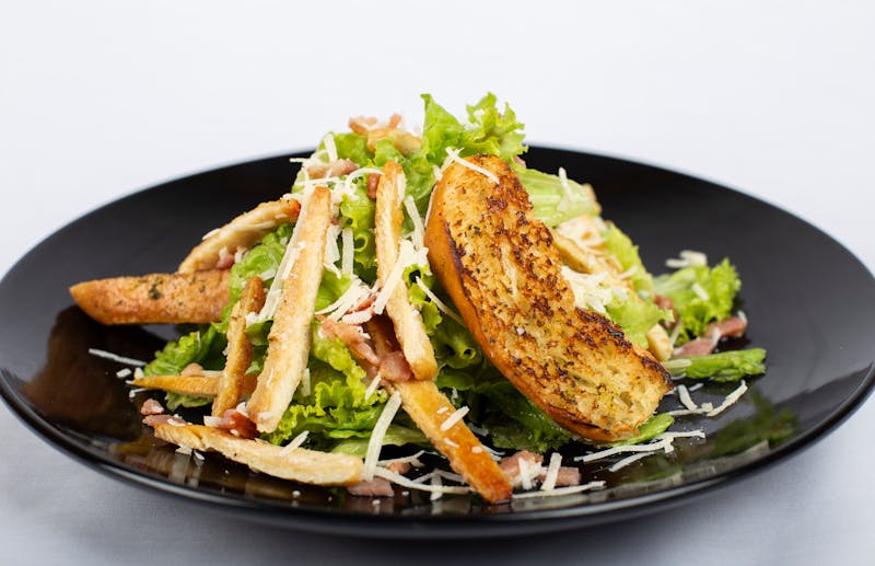 Classic Caesar salad with romaine and parmesan croutons