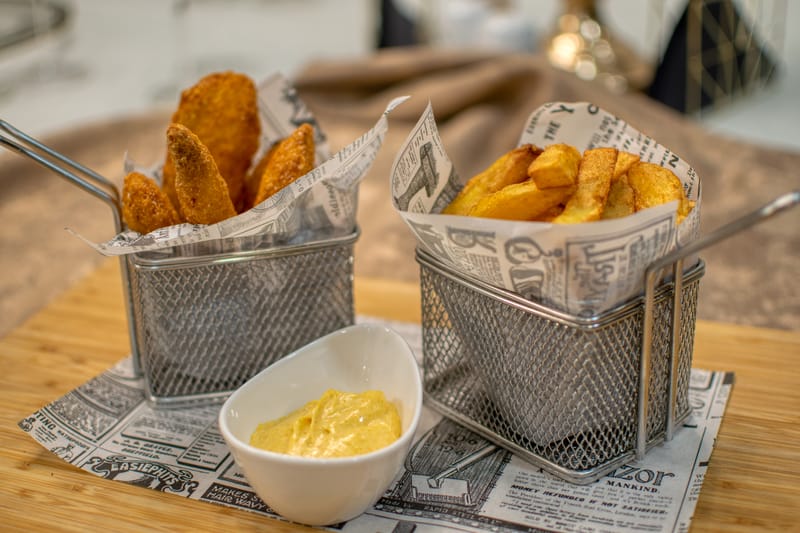 Crispy seasoned french fries with dipping sauce