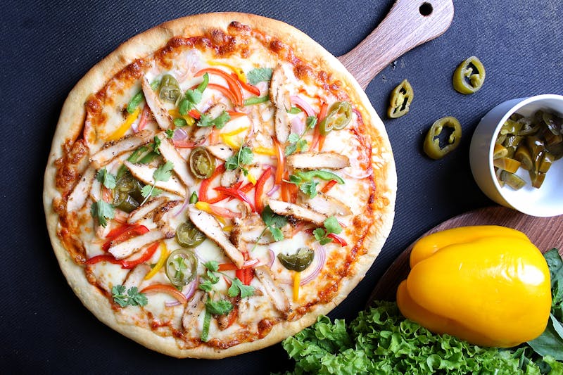 Meat lovers via 313 pizza with sausage and pepperoni